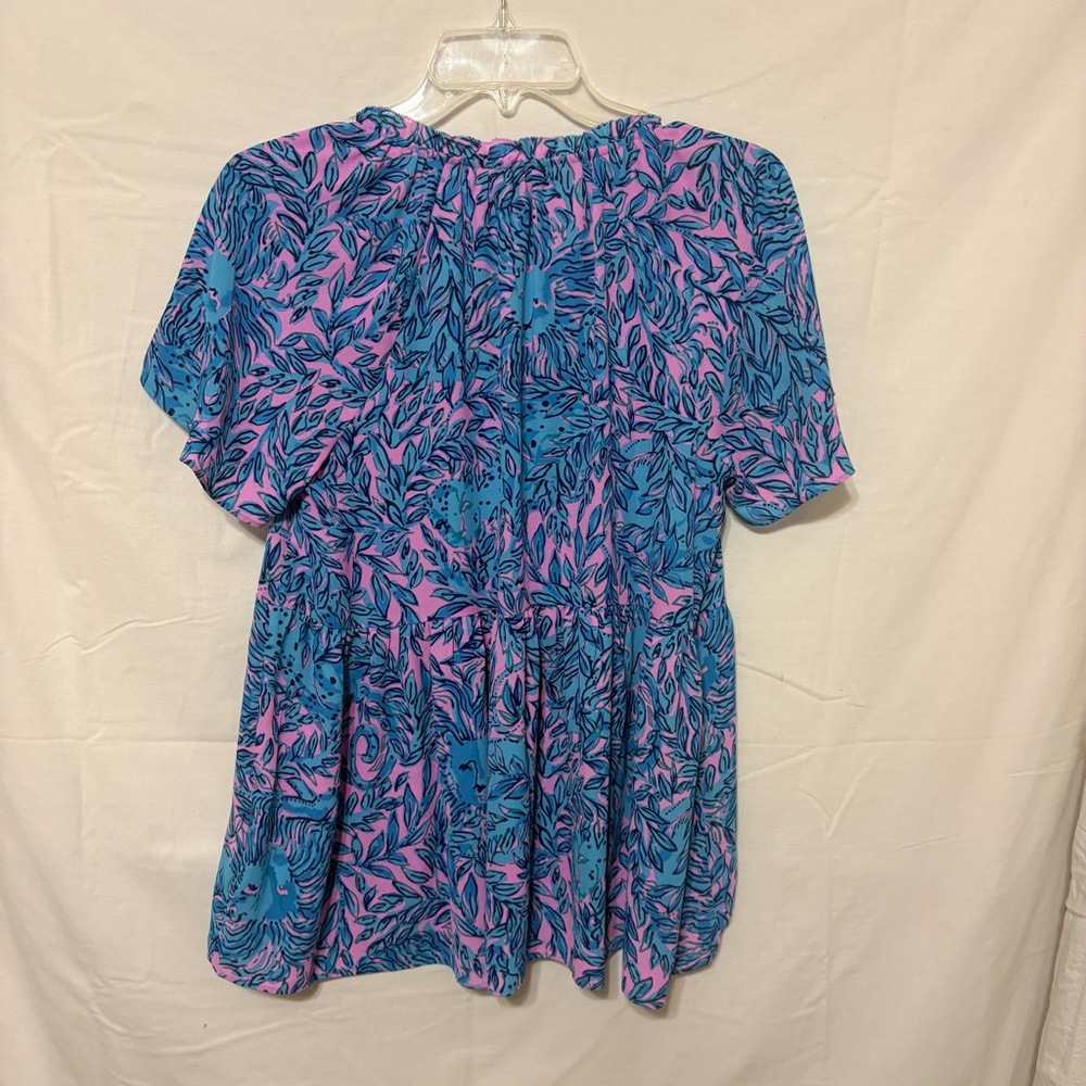 Lilly Pulitzer Zadie top featuring short flutter sleeves and a peplum silhouette - Picture 4 of 9